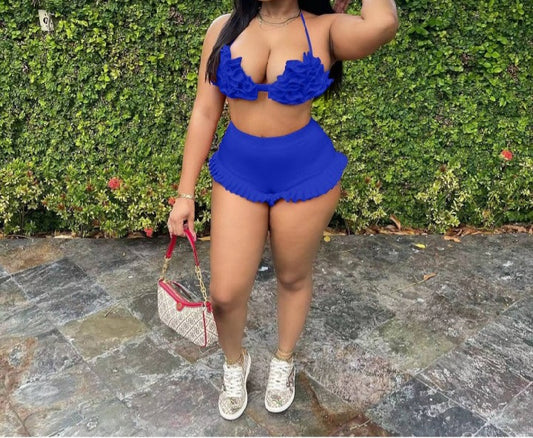 Royal blue ruffle bra & short shorts.